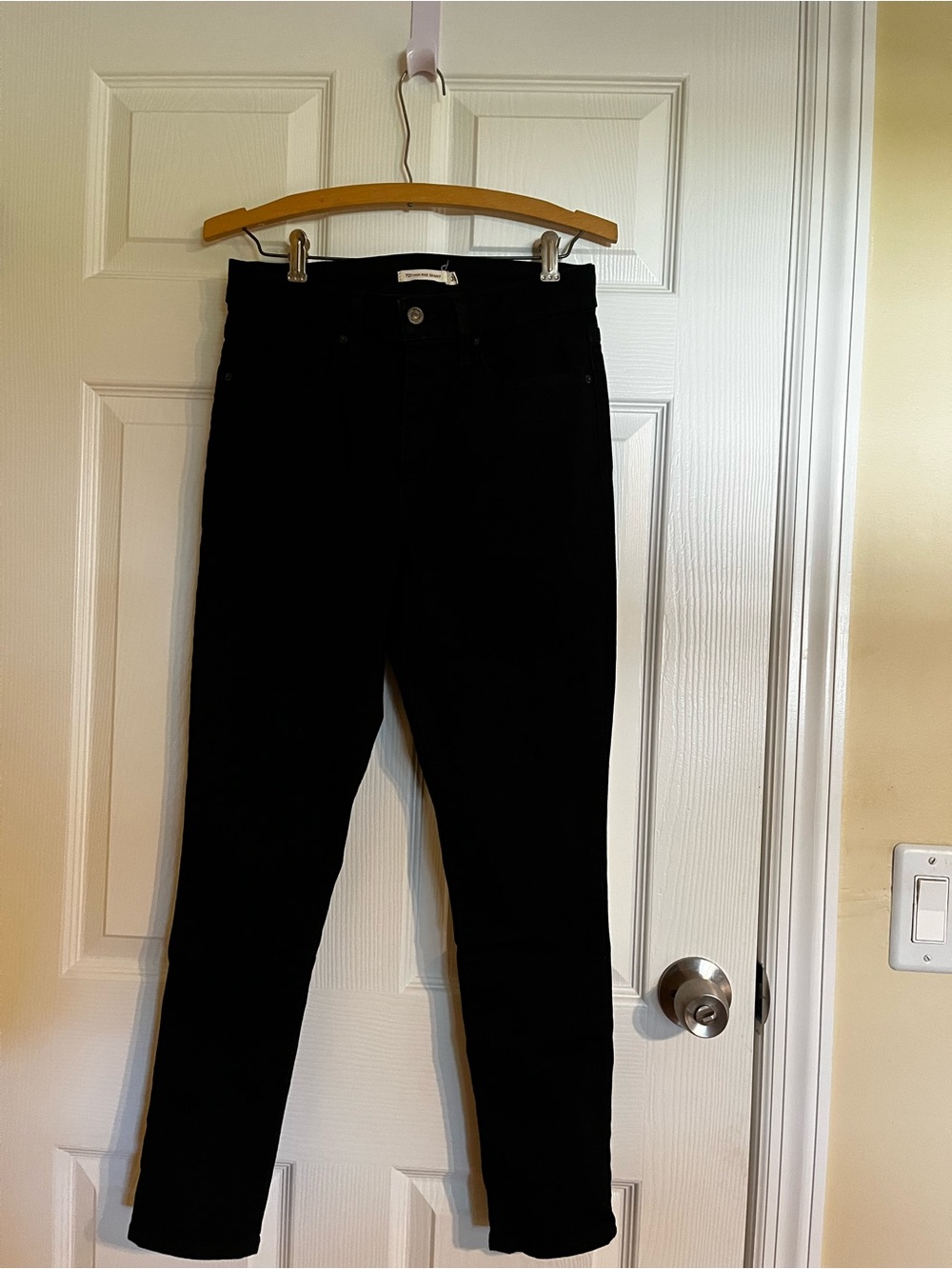 Levi’s black 821 high rise skinny jeans